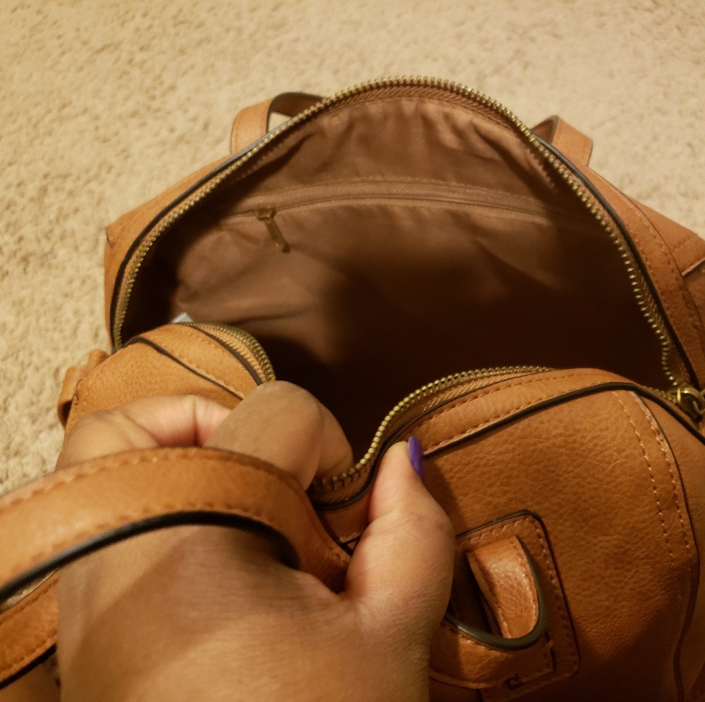 Tan crose body purse